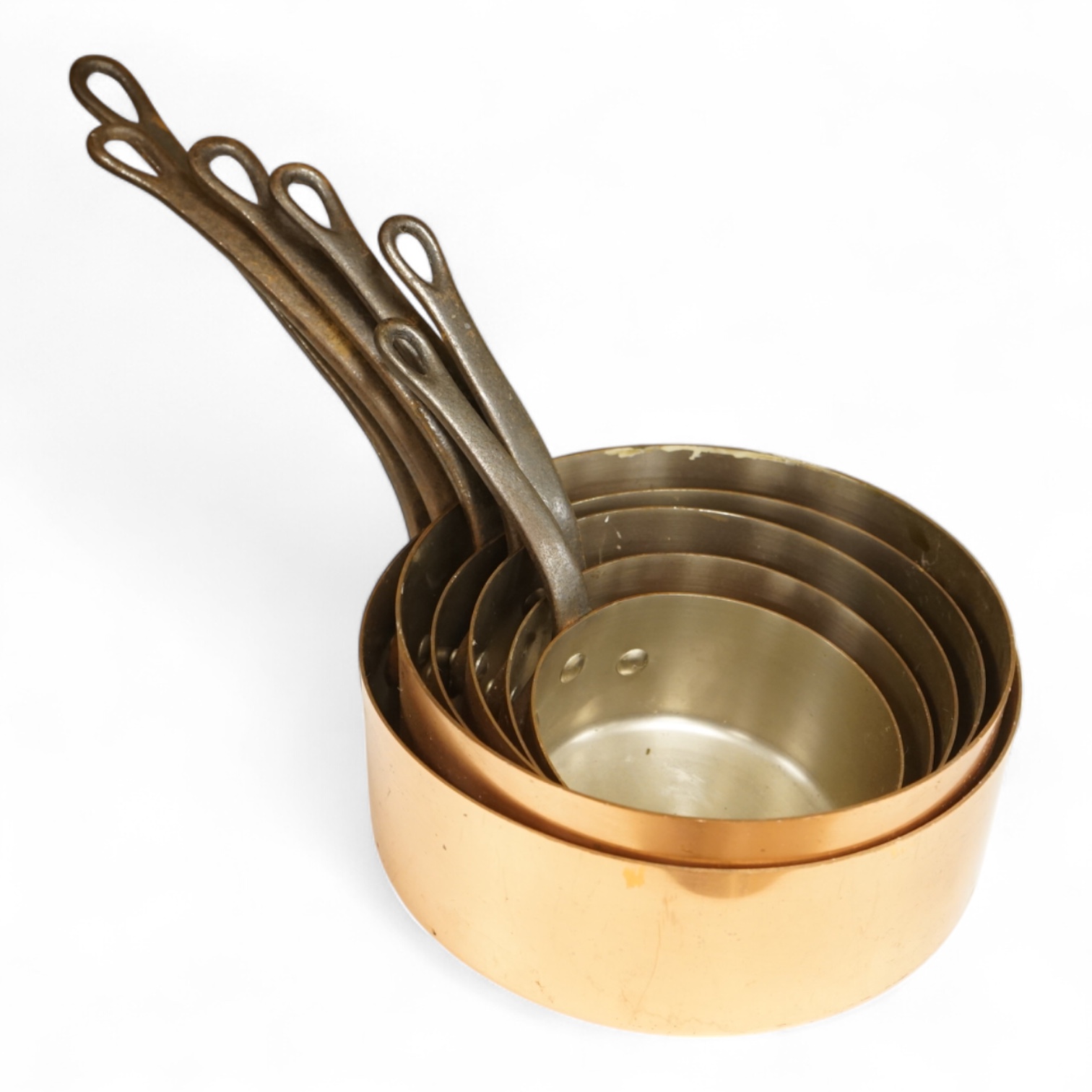 A graduated set of six French Tournus copper cooking pans, largest 44cm wide